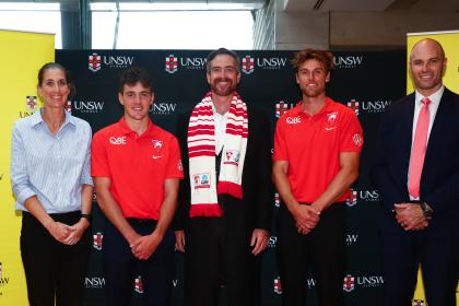 Sydney Swans players and administrators at UNSW to announce the partnership between the two organisations