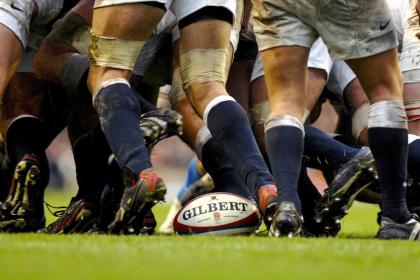 rugby players legs during a scrum